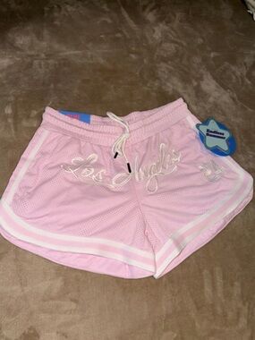 pastel pink mesh athletic shorts from Blue Riot XO.